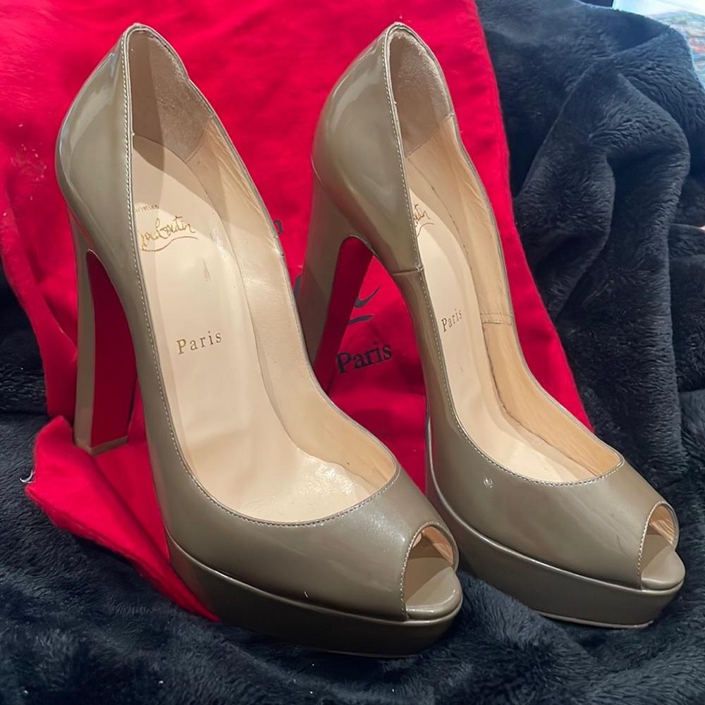 Slightly worn Christian Louboutins!! Beautiful shoe.